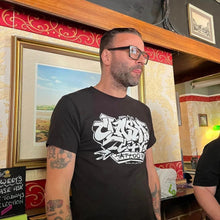 Load image into Gallery viewer, Clash City Tattoo Graffiti white on black tultex mens t shirt